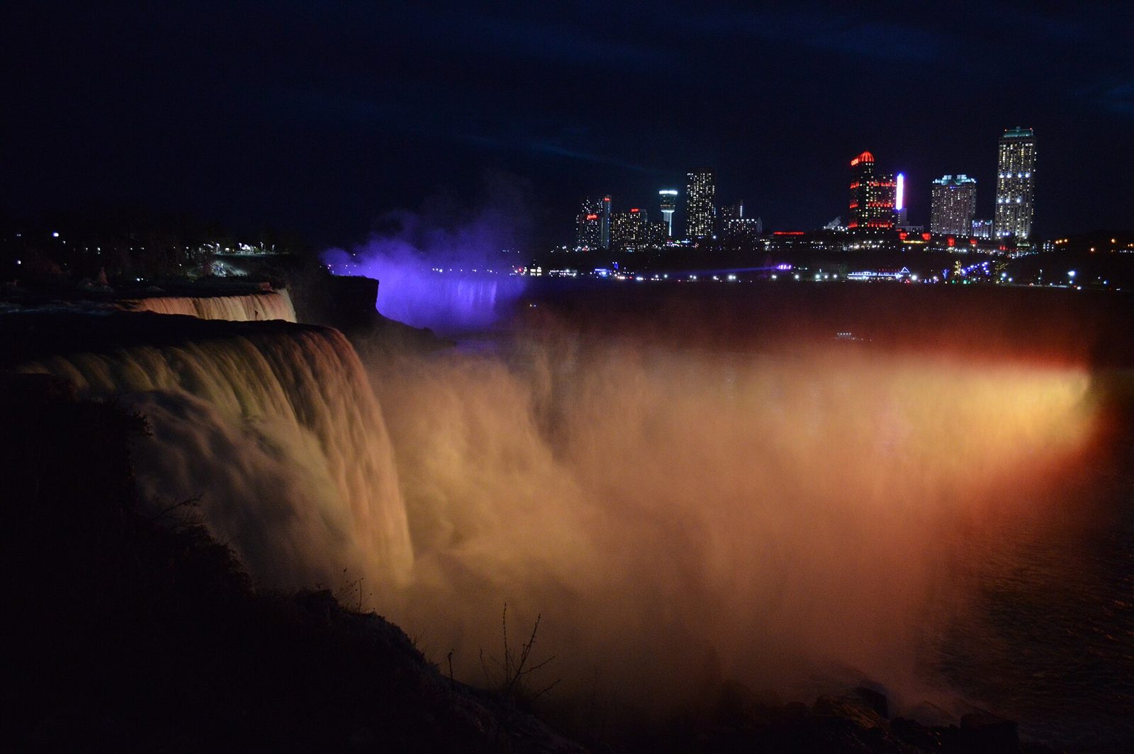 The Falls illuminated at night